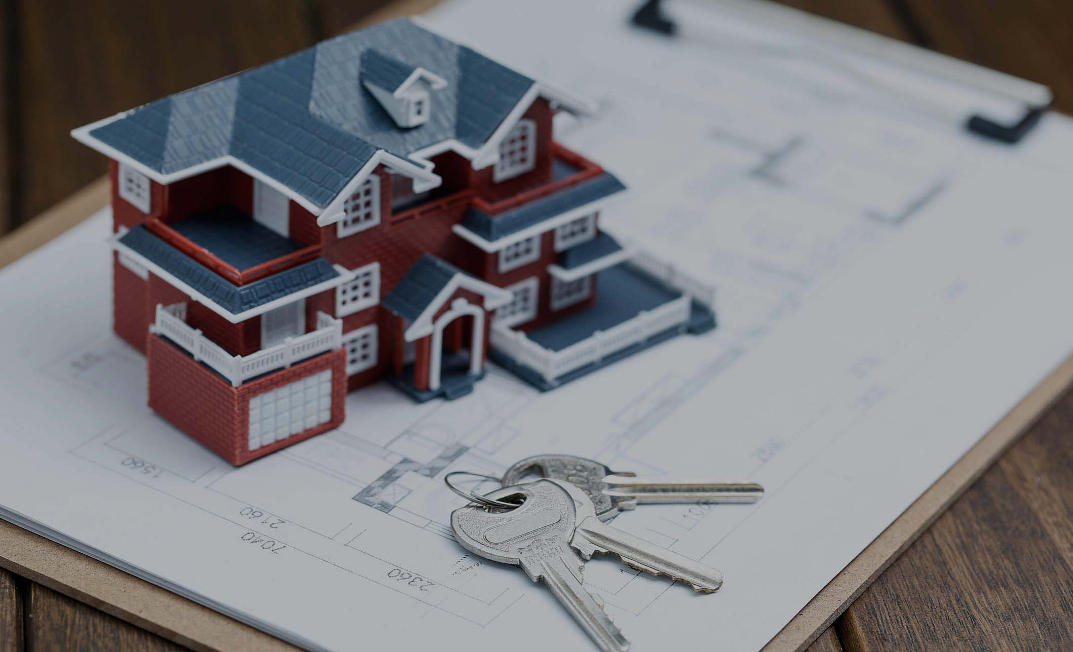 villa-house-model-key-drawing-retro-desktop-real-estate-sale-concept V2 small Feature